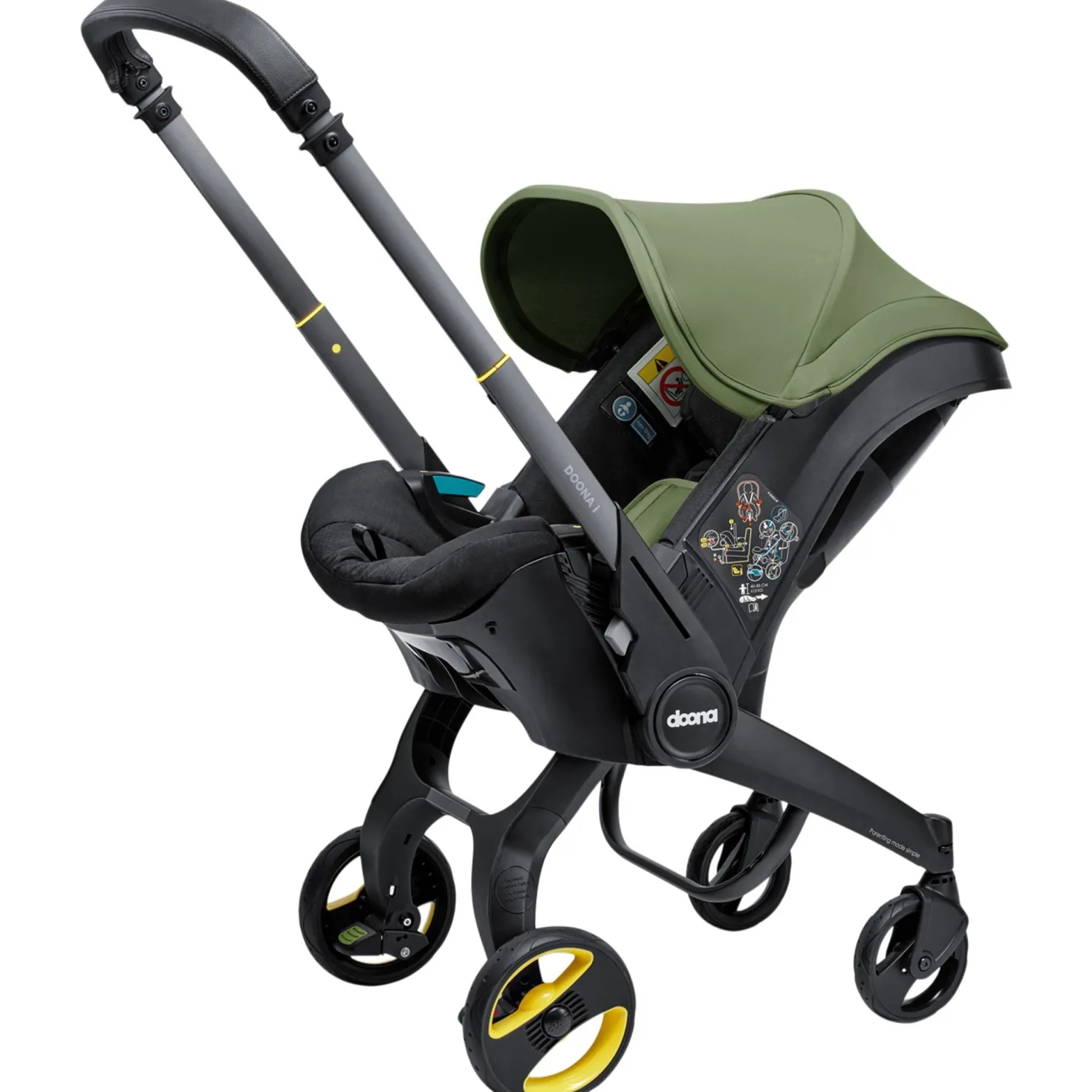 Doona I Babyskydd Och Barnvagn I Ett Desert Green