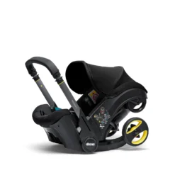 Doona I Babyskydd Och Barnvagn I Ett Nitro Black